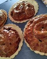 a bunch of pies on a table