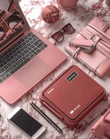 a laptop computer and a laptop on a table