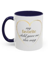 a mug mug with a heart shaped design on it