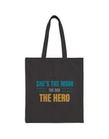 a black bag with she's the hero she is the hero she is the