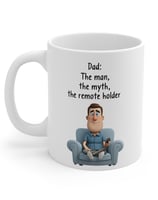 a man sitting on a couch with a remote control