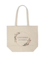 a tote bag with a wreath of leaves and a wreath of leaves