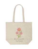 a tote bag with a flower blooming in the middle