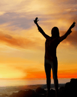 A woman walking towards a clear horizon can represent the journey towards a full and balanced life.