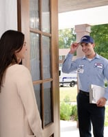 Roto-Rooter Service Technician Greeting Female Client