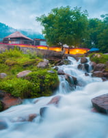 a waterfall flowing down a mountain side. arbab naimat kasi , kalam naran