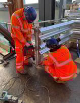 Reclaimed armco barrier on reclaimed steel posts