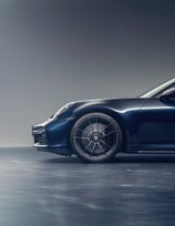 a blue porsche 911 wheel wallpaper