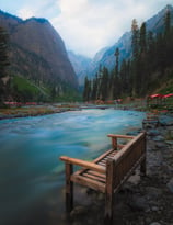 a wooden bench with a wooden bench and a wooden bench with a wooden bench and. arbab naimat kasi  