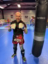 Portrait du coach et président du club de boxe