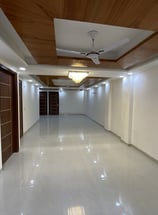 Ultra-spacious living room of 3 BHK Corner Builder Floor with Multiple Balconies — Chattarpur