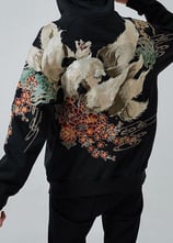 Close-up embroidery stitching on premium branded garments