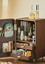 a small cabinet with a mirror and a mirror