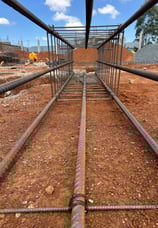 a metal structure with a metal wire fence and a metal wire fence