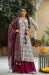 Palazzo pants paired with kurtas create a breezy, graceful ensemble. The flowy bottoms balance out b