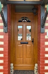 wood coloured new composite front door fitted in Hampshire