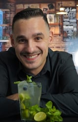 a man with a mojitte and a mojitte
