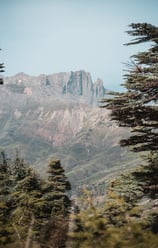 a mountain scene with a mountain view of a mountain range