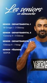 a man in a blue shirt is holding a tennis racket