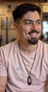 Rafael castillo a software engineer with a beard and a necklace on his neck