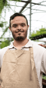 Disabled Adult Male in a greenhouse