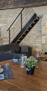 a dining room table with a table and chairs