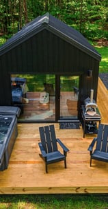 Tiny home pod with deck, hot tub, and outdoor seating