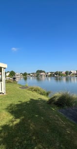 a house with a boat on the water, Zuytland-Buiten Simonshaven, Zuid-Holland