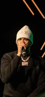 K trap performing at a Nike event