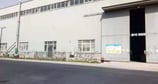 Side photo of the factory building.