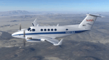 N801NA NASA aircraft flying over a desert.