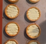 a baking tray with a cookie crust and a cookie crust