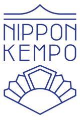 a blue and white logo with the words nippon kempo