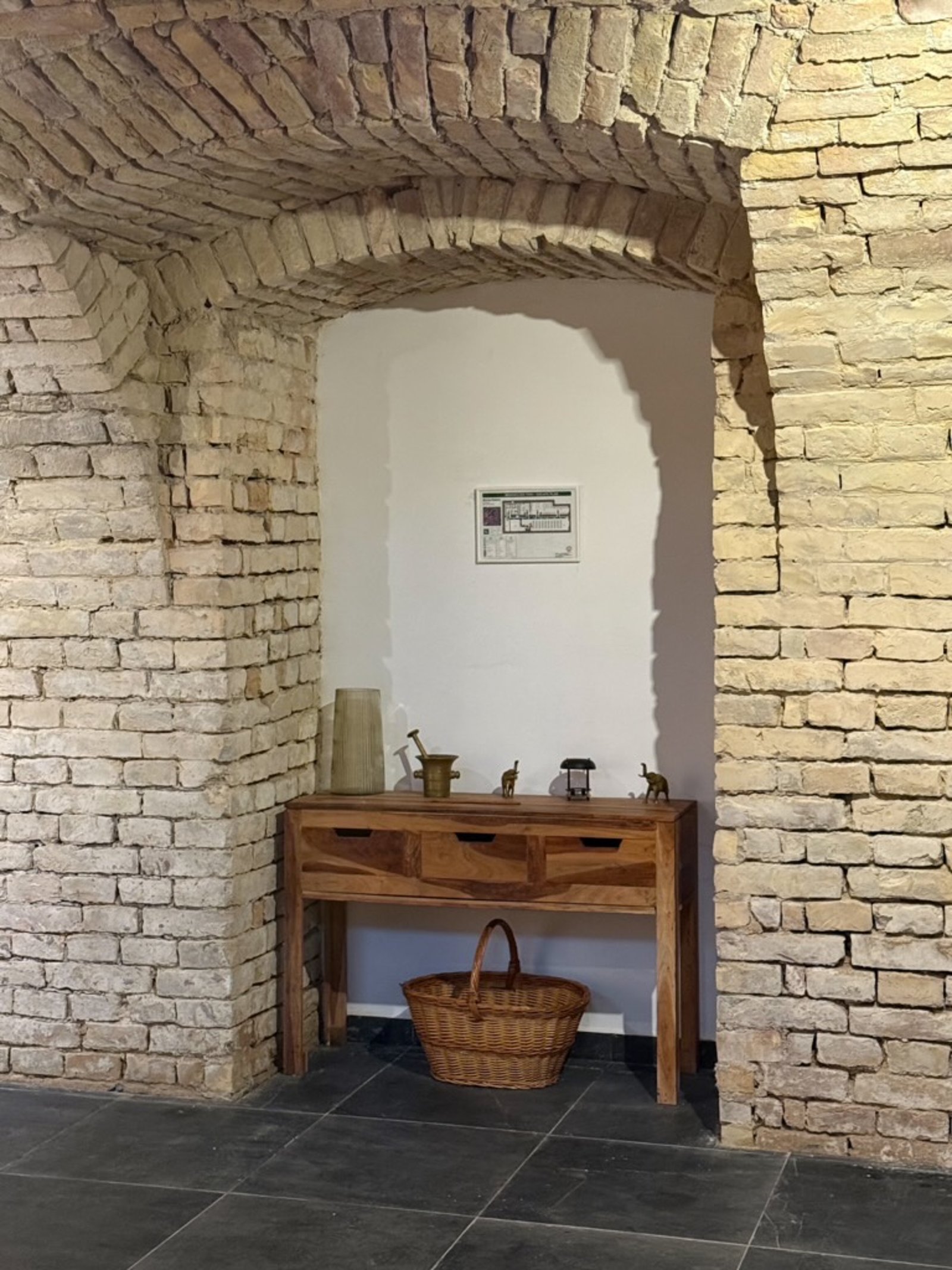 The Curiosity Space — vaulted, quiet, considered