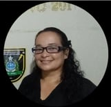 a woman in glasses and a black shirt