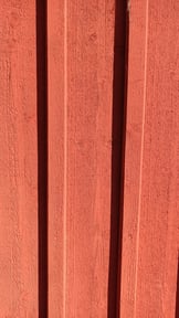 10 years old barn red painted on wood with natural barn paint
