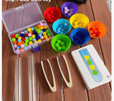 a variety of colorful plastic balls and plastic beads