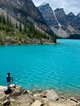 Picture of me taking a picture at Moraine Lake, Canada. This was on a roadtrip 2025.