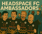 a group of people standing in front of a poster