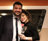 a man and woman standing next to each other