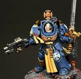 a high lvl queality terminator captain from warhammer 40k, he is a space marine from the ultramarine