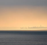 Romanshorn am Bodensee - Silhouette der Stadt bei Sonnenaufgang über dem See