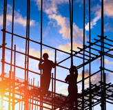 a man standing on a scaffold of scaffolding