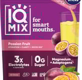 a bag of fruit juice with a glass of juice