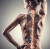 a woman with a back pain and a spiner