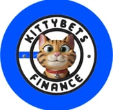 a cat sitting on top of a blue circle