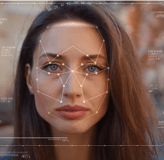 a woman with a facial recognition system on her face