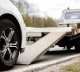 carro sendo guinchado, defesa jurídica ação de busca e apreensão de veículo.