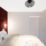 Zoom sur le mobilier sur mesure de la seconde chambre de l'appartement à Knokke