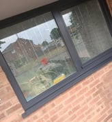 Finished dark grey UPVC windows after spraying on residential property in Worcester